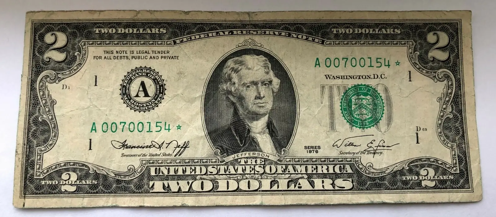 a standard 1976 2 dollar bill